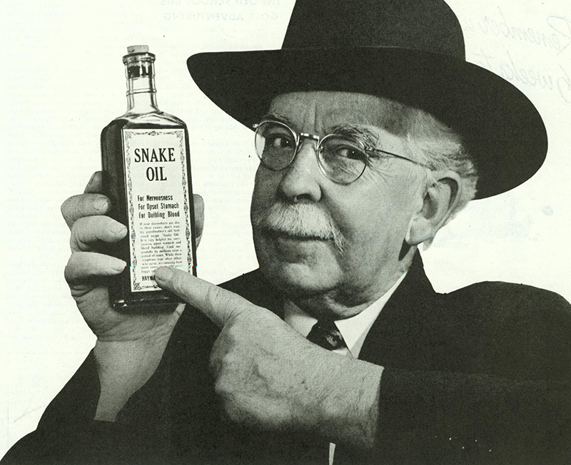 Guy with bottle of snake oil